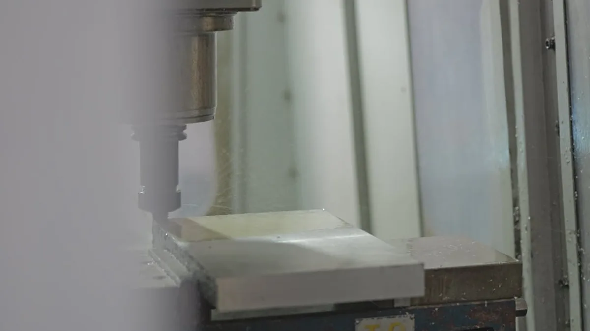 CNC machining a precision metal component